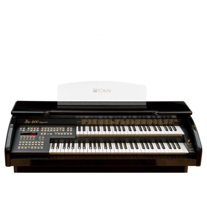 O órgão Tokai YX-400 Preto é um instrumento musical usado, com um design clássico e elegante. Possui teclas sensíveis ao toque, permitindo uma maior expressividade na execução das notas. Com diversas opções de timbres e ritmos, é ideal para quem busca um