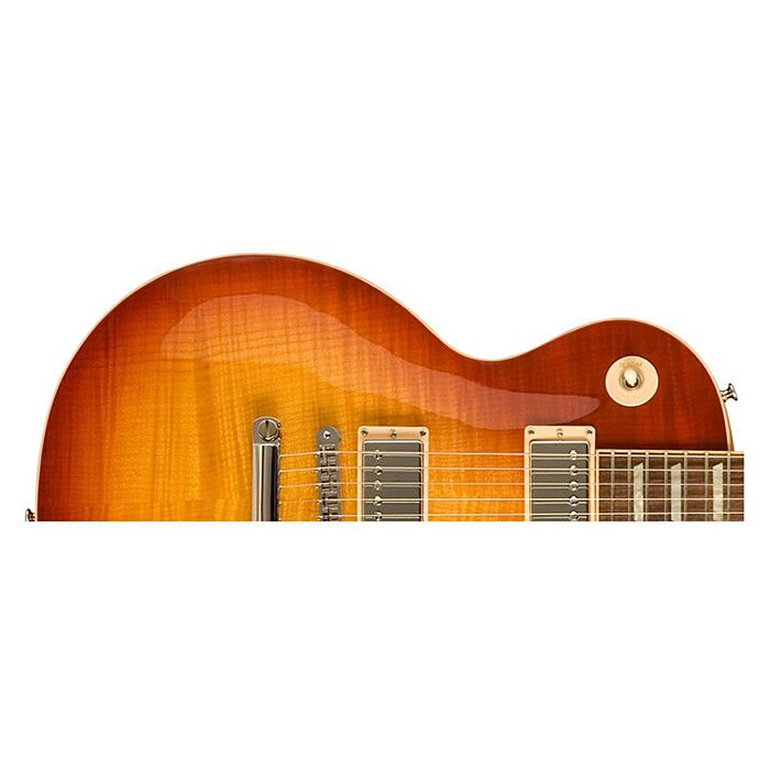 A Gibson Les Paul Traditional é uma guitarra elétrica icônica, conhecida por seu som poderoso e versátil. Com um corpo sólido de mogno e tampo de maple, possui dois captadores humbucker que oferecem um som encorpado e rico em harmônicos. O braço em mogno 