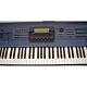 Sintetizador Yamaha EX-5 com recursos avançados de performance e gravação.